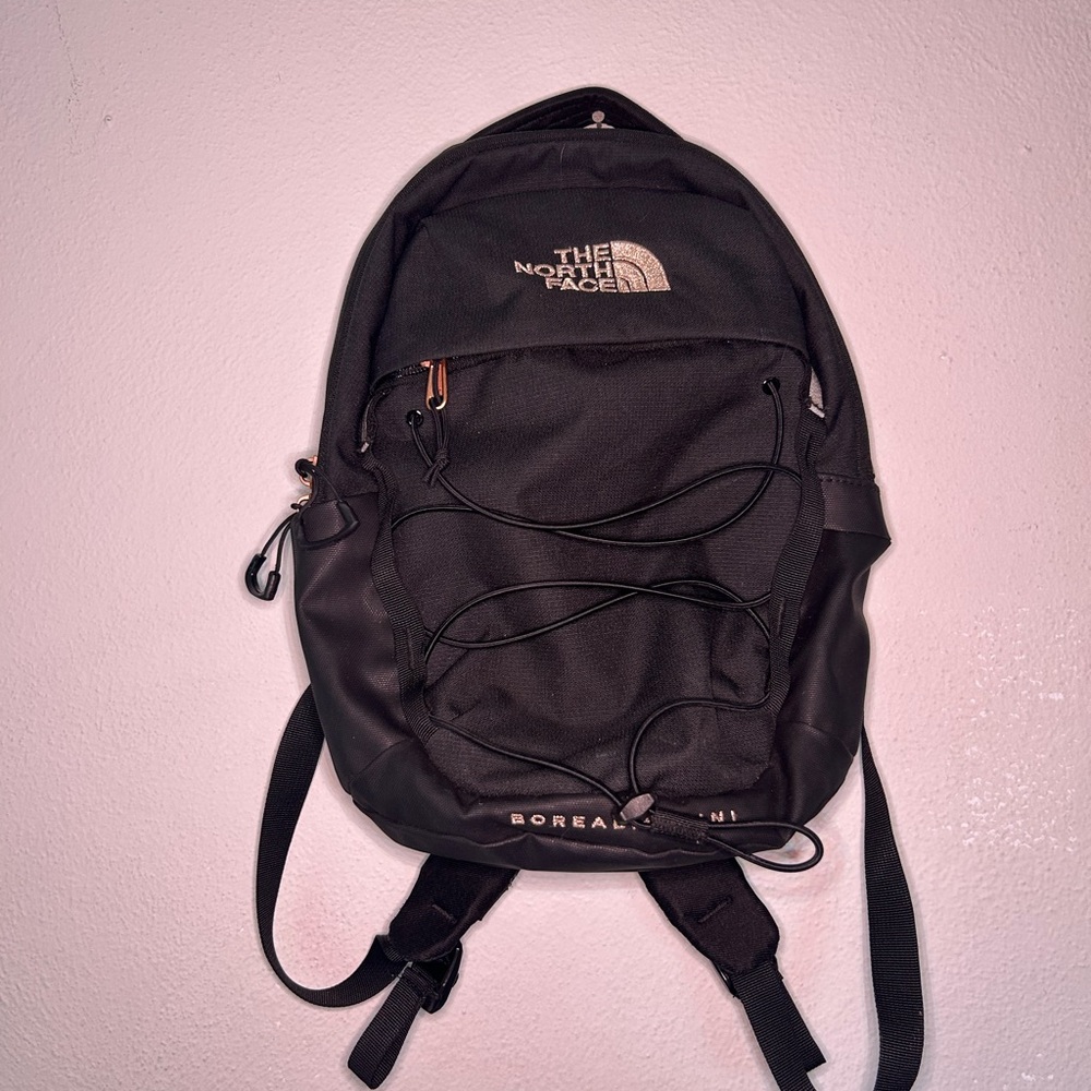 The North Face Black Mini Borealis Backpack with Rose Gold accents